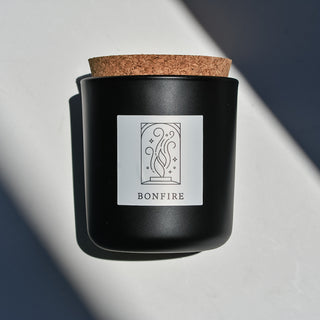 Bonfire black glass candle with cork top.