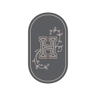 charcoal oval H logo with tendrils on either side