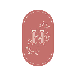 guava oval H logo with tendrils on either side